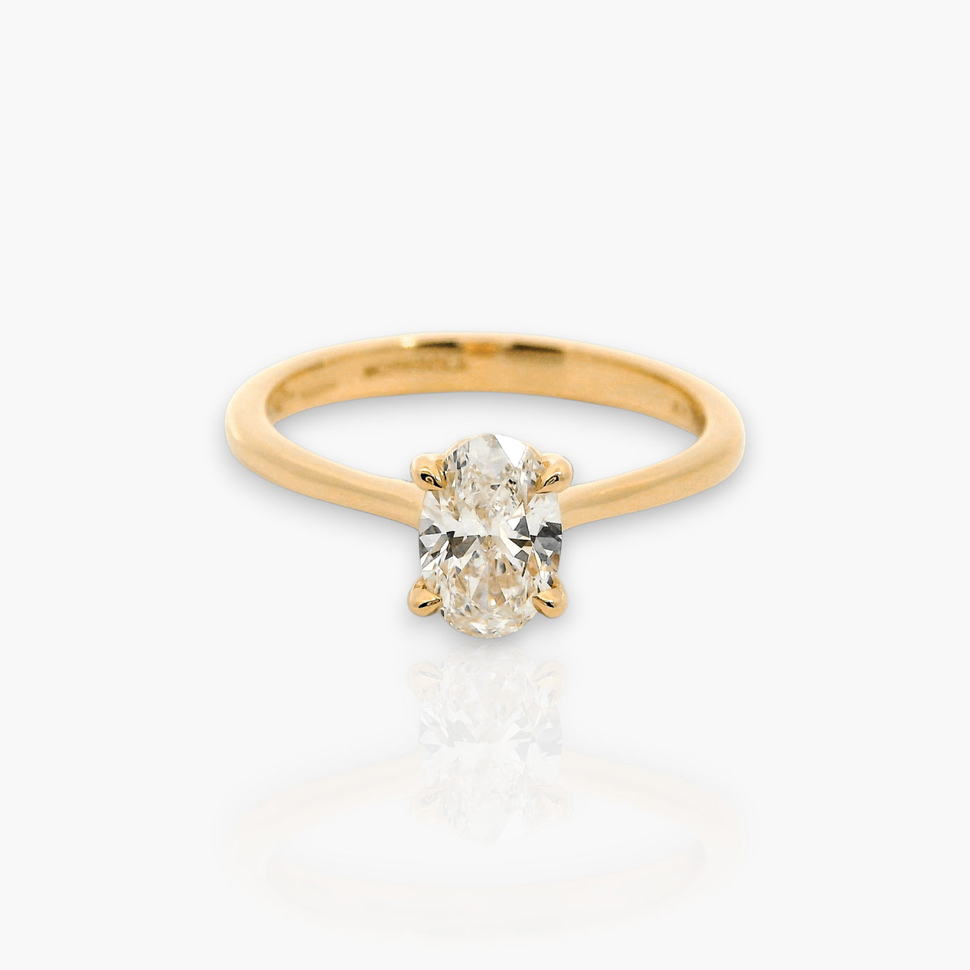 18kt Rose Gold Engagement Ring with oval diamond