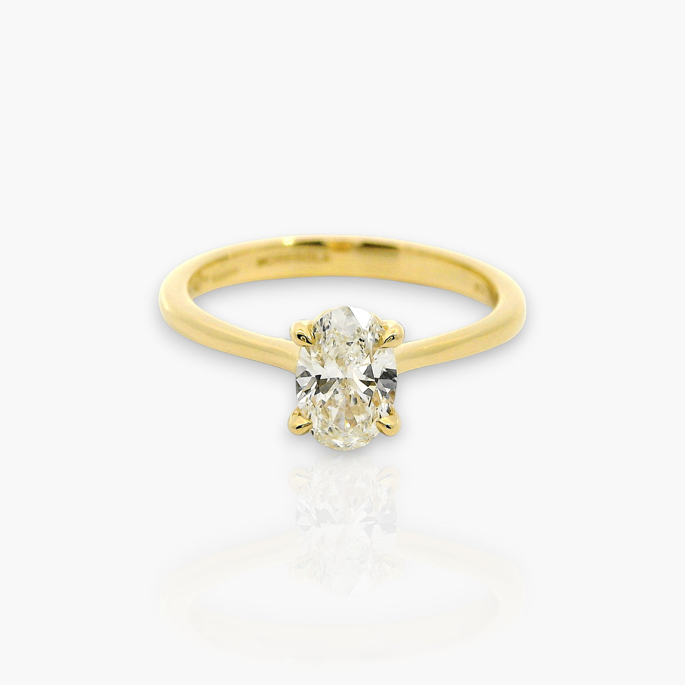 18kt Yellow Gold Engagement Ring with oval diamond