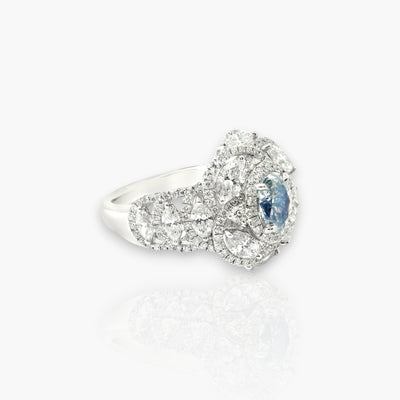 18kt Goldring mit fancy blauem Diamanten
