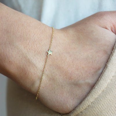 18kt Gold Bracelet with star motive