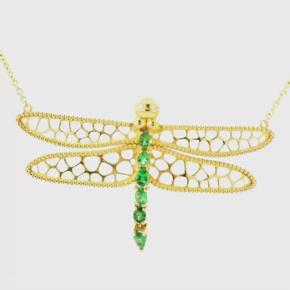 Dragonfly necklace in 18kt yello gold with green emeralds