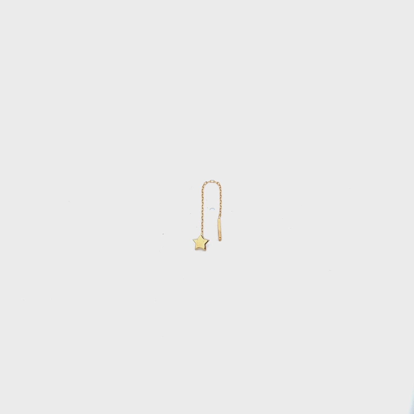 18kt gold mono earring with star pendant